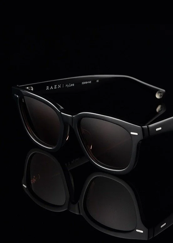 RAEN Myles black sunglasses product photography with reflection