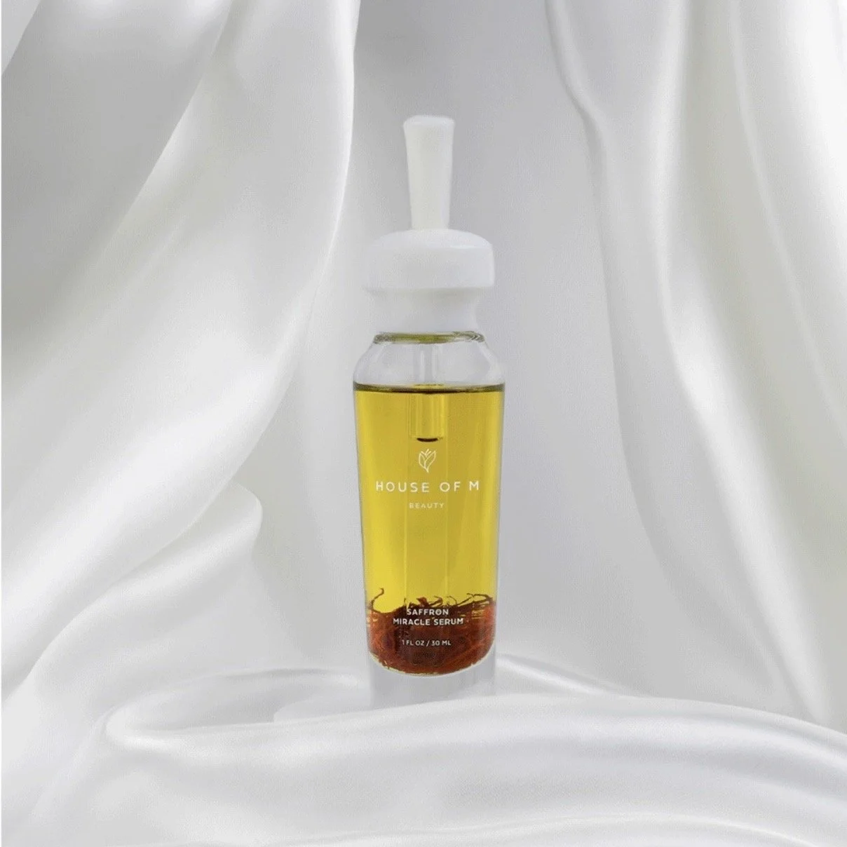 A luxury skincare serum campaign, photographed by a commercial photographer in Los Angeles