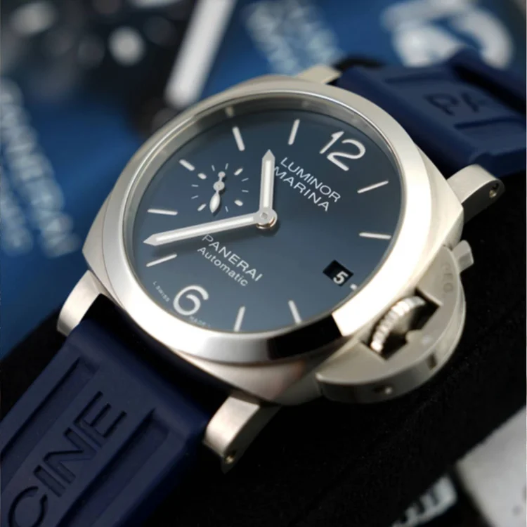 Holiday gifting campaign image featuring a luxury Panerai watch photographed close up with controlled reflections and sharp metal detail.