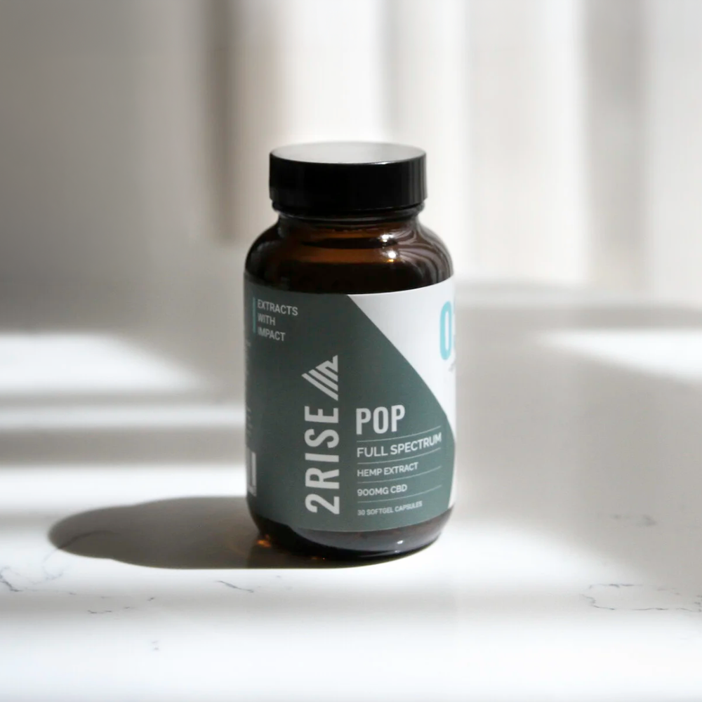 2RISE POP supplement bottle studio product photography in soft window light