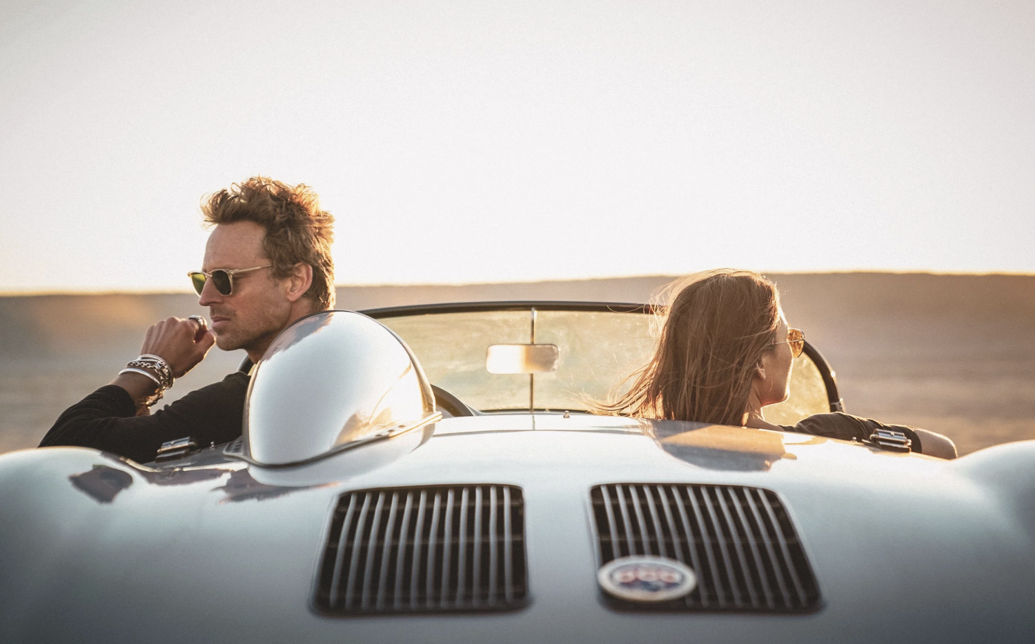 Golden-hour commercial photography campaign in Malibu for a premium men's jewelry brand, photographed on the Southern California coast