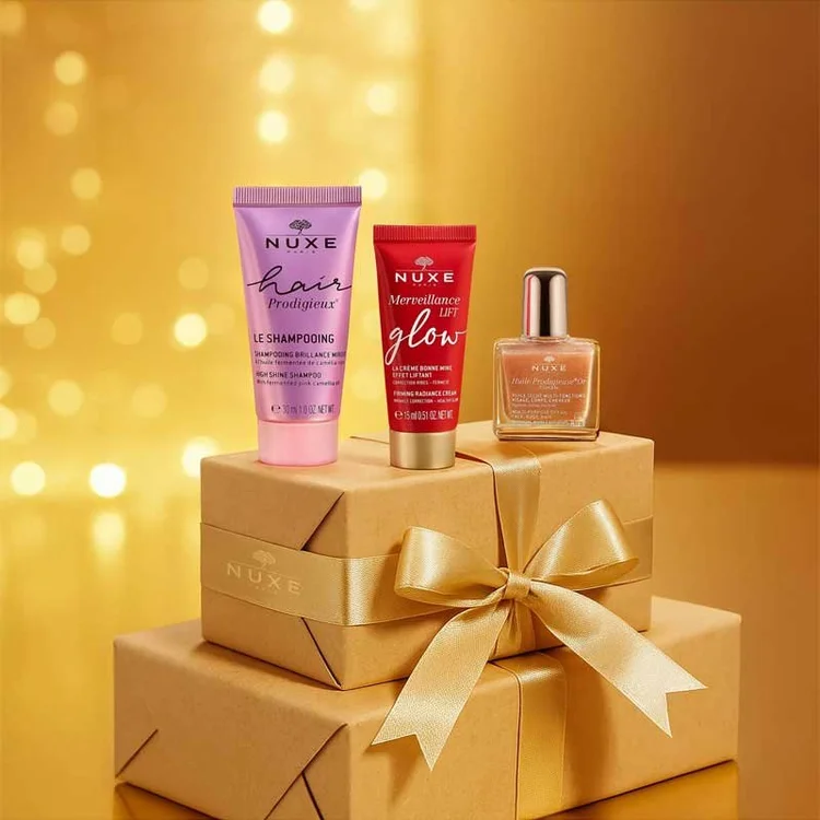 Holiday hair care gift set styled with festive props for a Christmas beauty campaign.