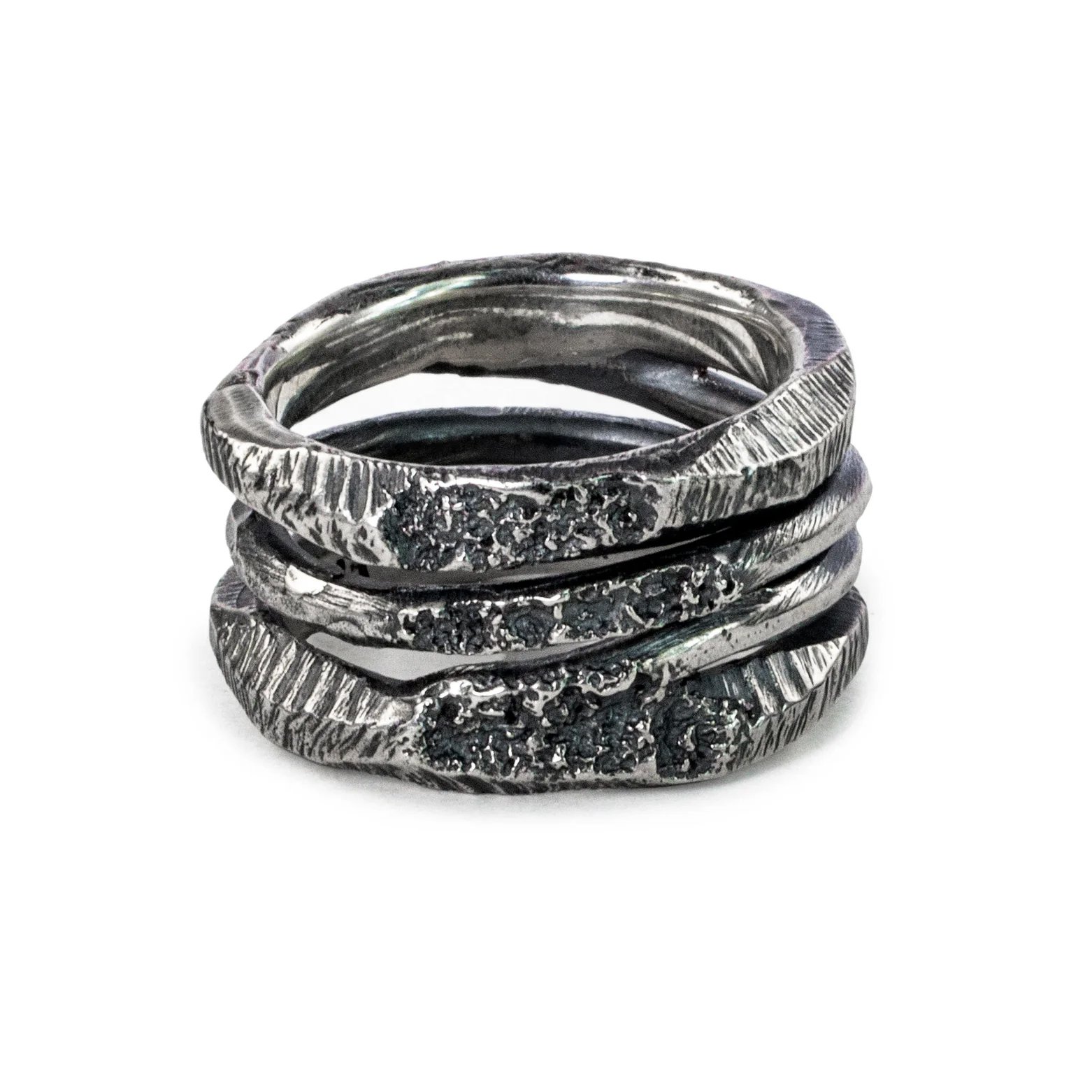 White background men's jewelry product photography Los Angeles — stacked rings studio shot for online store