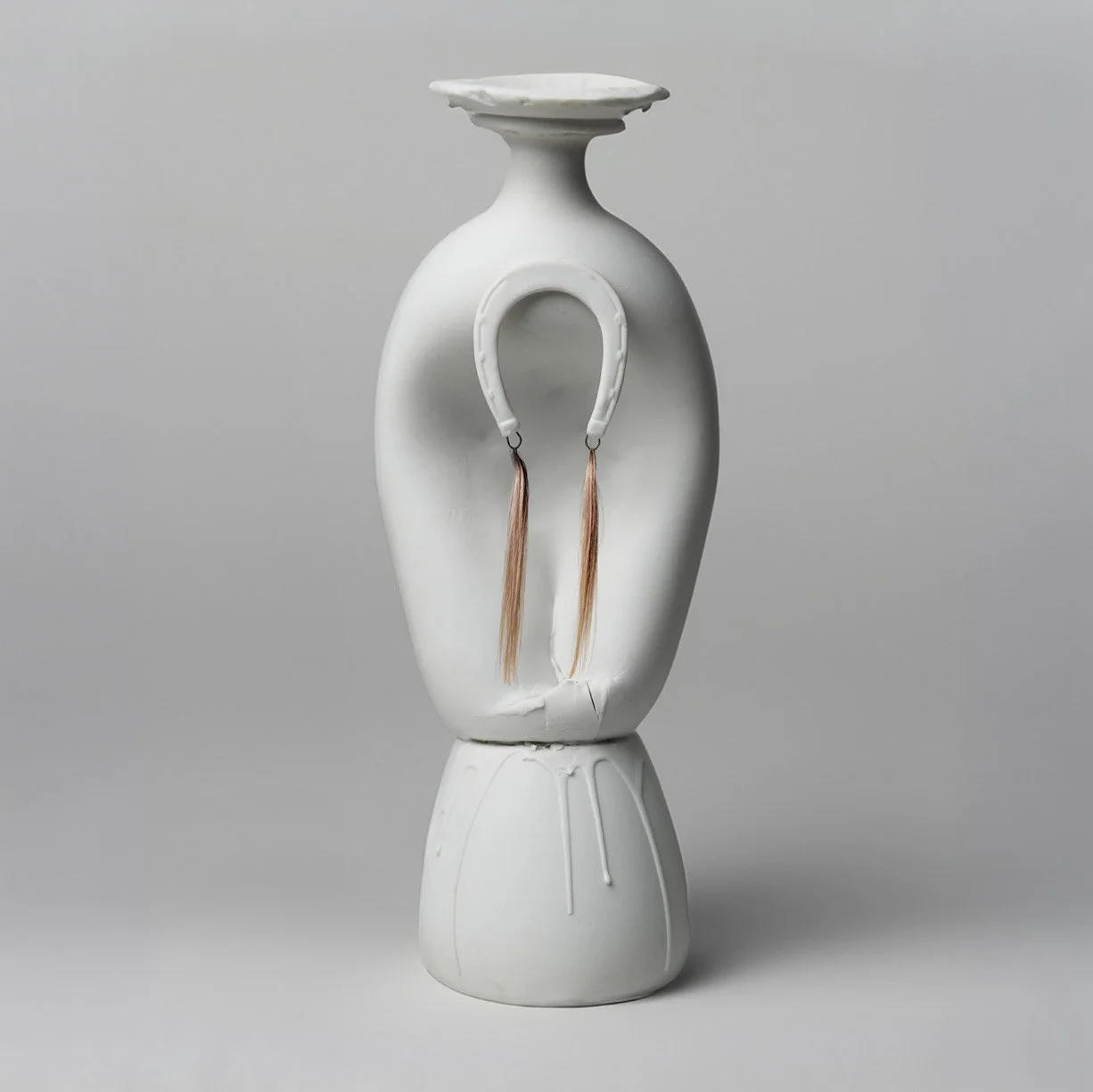White sculpture vase product photography