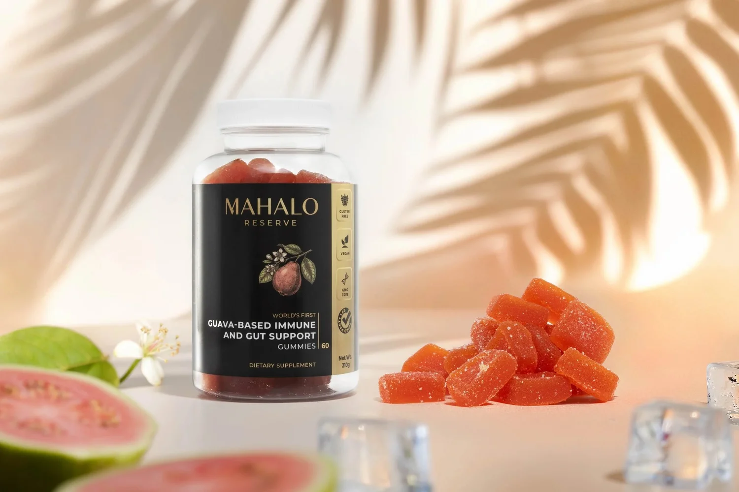 Commercial product photograph of Mahalo Reserve guava immune and gut support gummies, styled with fresh guava and loose gummies in warm directional sunlight with tropical palm-leaf shadows, controlled reflections and crisp packaging detail