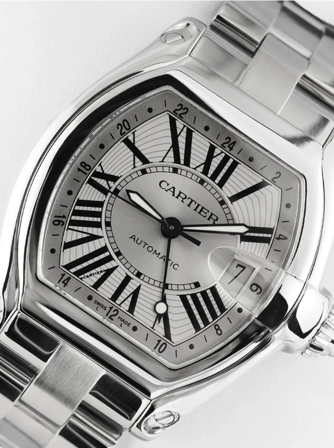 A Cartier watch with a white dial, studio commercial photography in Los Angeles