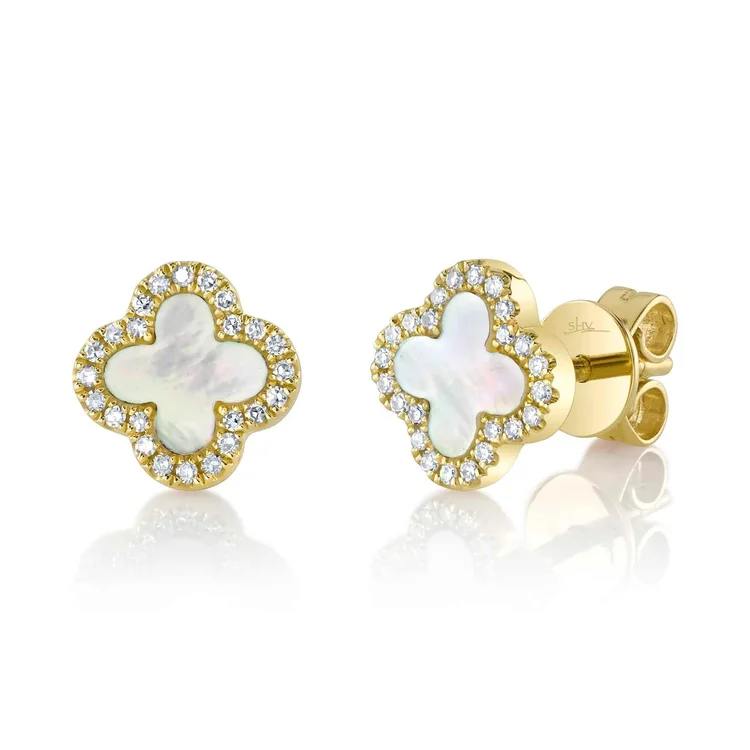Gold clover earrings with white shell inlay on white