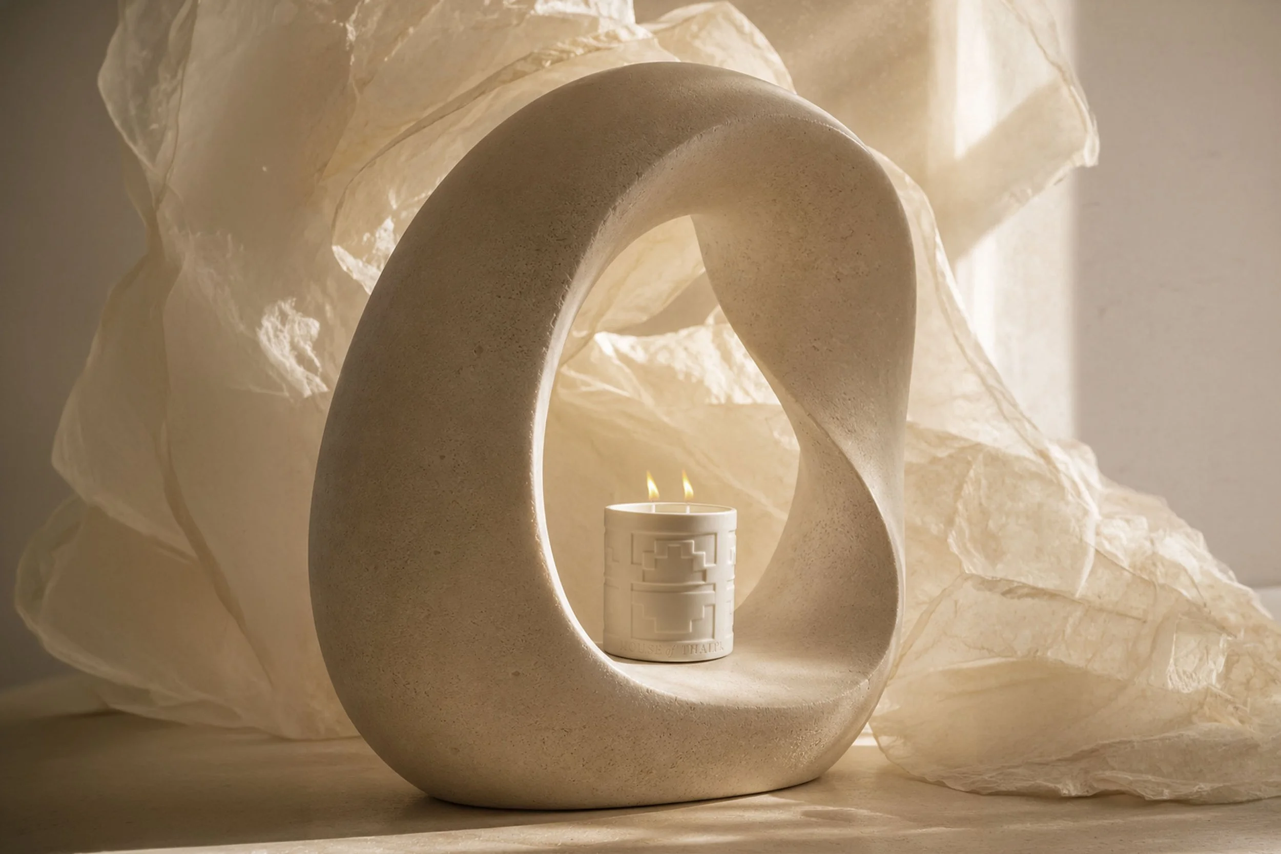 Commercial beauty product photography of skincare products styled on glass with soft natural light and clean studio shadows - Chris Frara Studios