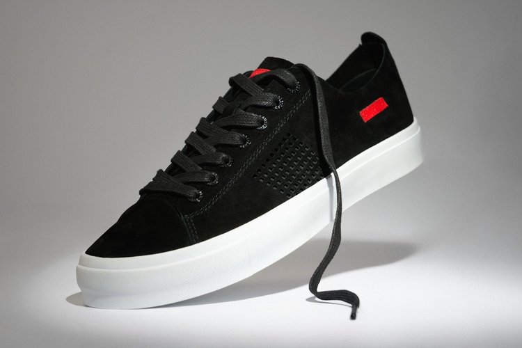Black and white photograph of Savalé footwear on a minimal set, with soft contrast and clean edges.