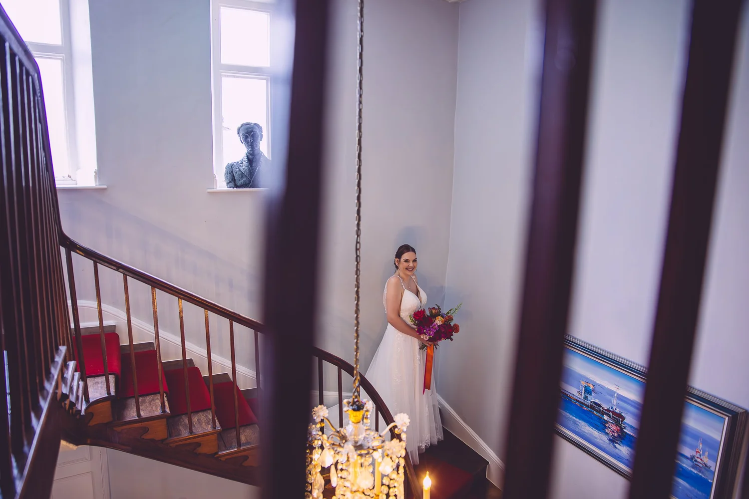 Bride on the staircase at Sudbury House, Faringdon