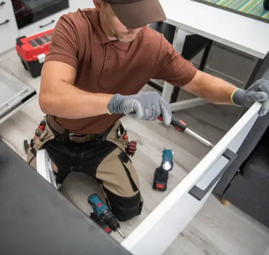 Handyman mounting a TV