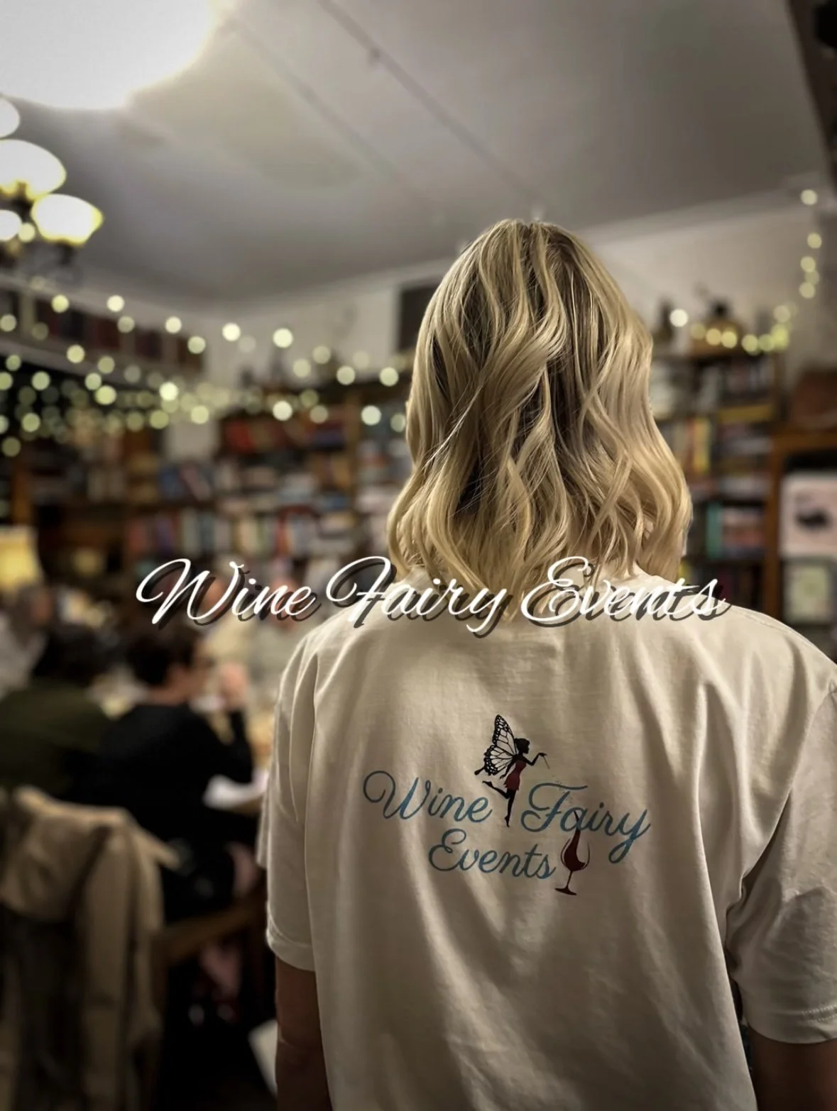 Kat in her Wine Fairy Events shirt at a wine night at The Press Book House in Newcastle