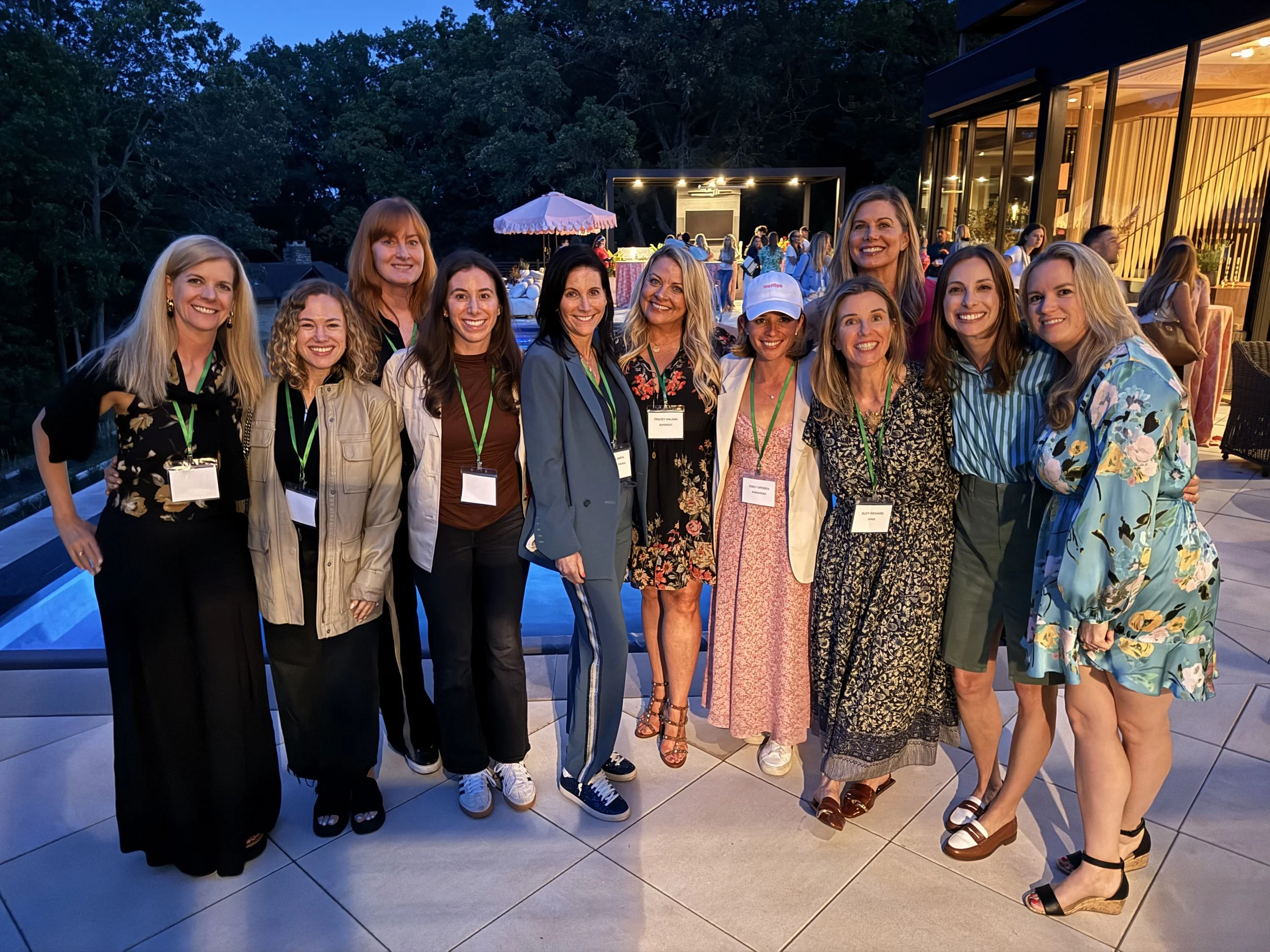 Women enjoying the poolside event