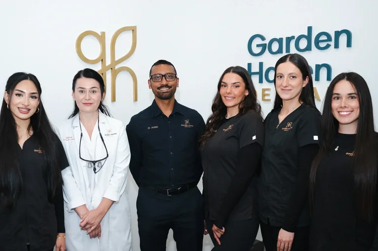 Dental practice brand applied across signage and patient collateral