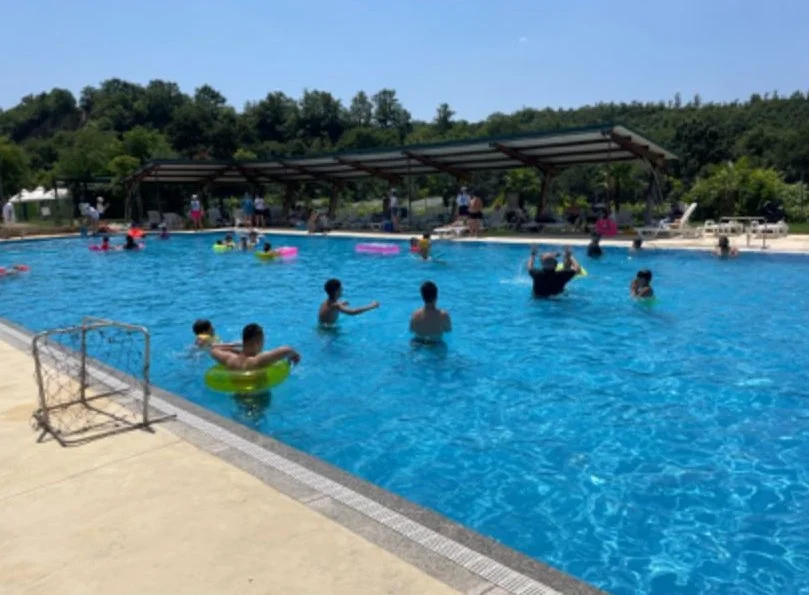 Flow camp — children and adults with disabilities in the swimming pool