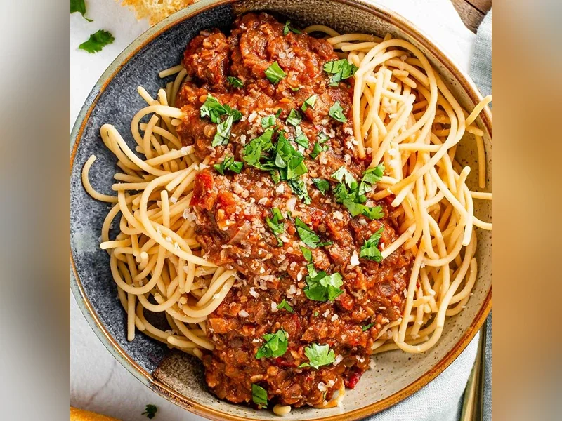 Lentil and walnut ragù over pasta - vegetarian catering option Metro Detroit