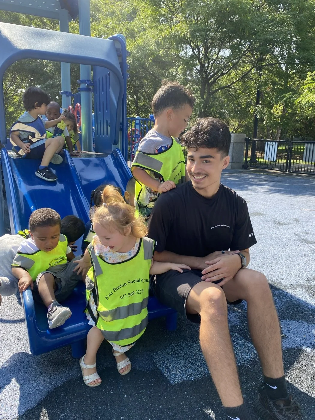 A teen Associate with children from EBSC's Early Learners and out-of-school-time programs.