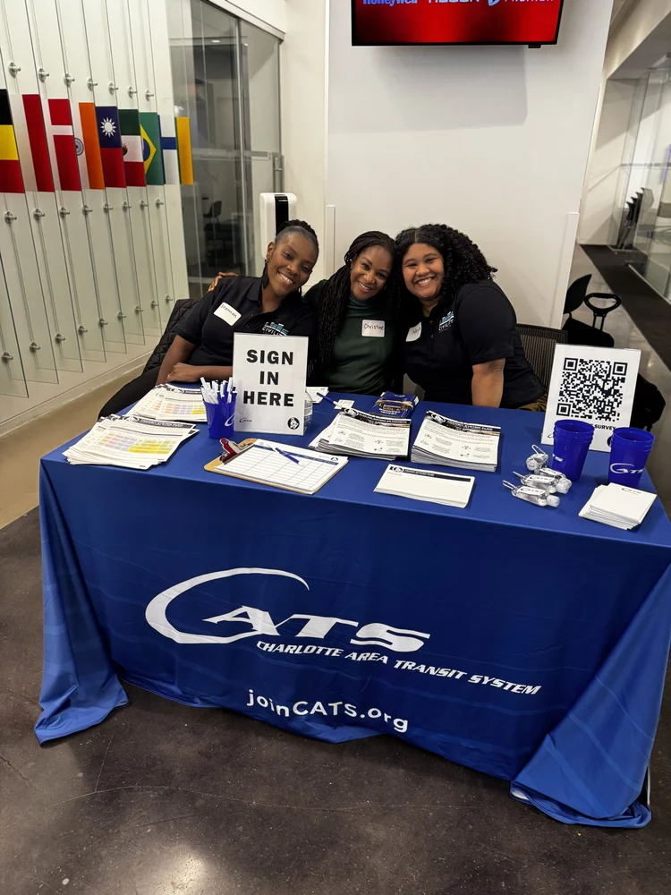 Civility Localized founder Christine Edwards Pitkin with two new Ambassadors tables at a CATS event in March, 2025