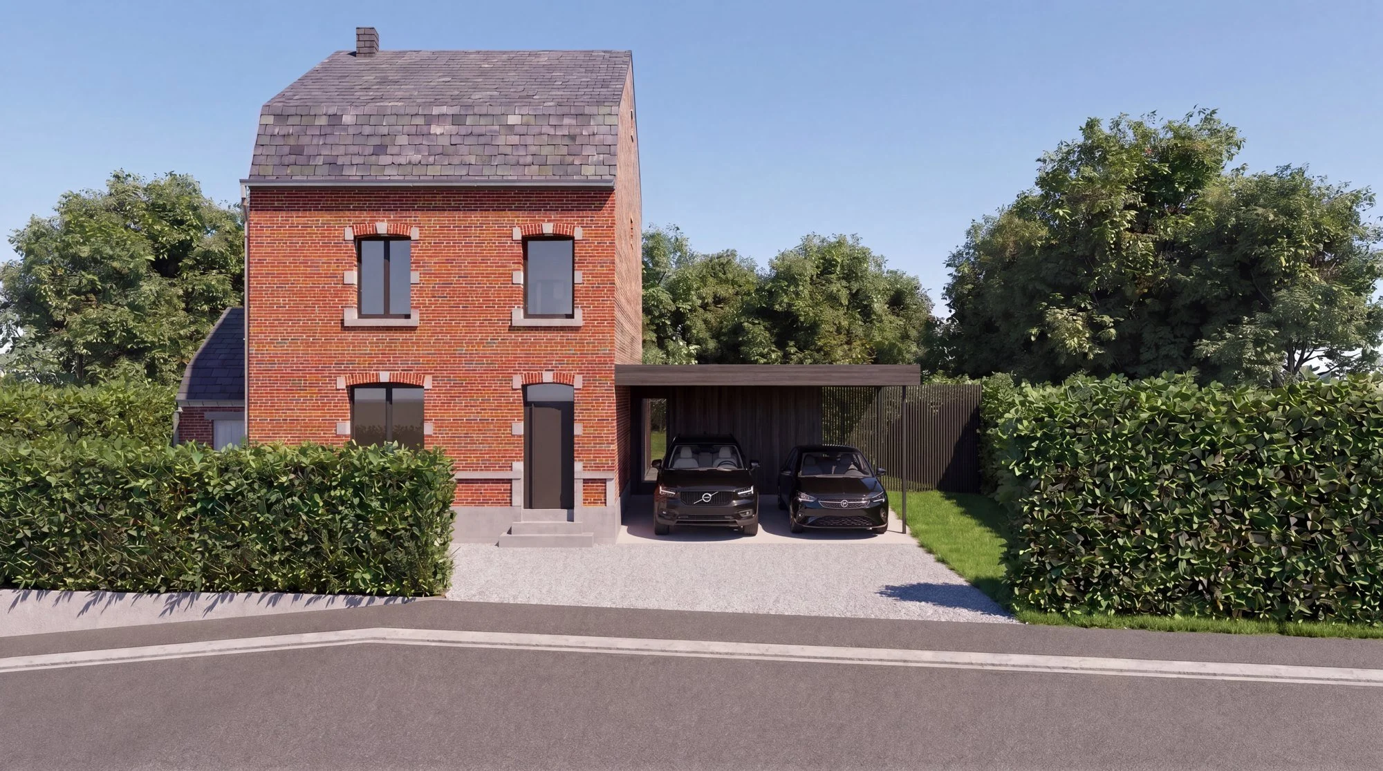 Vue de la maison et du nouveau volume en bardage avec le carport