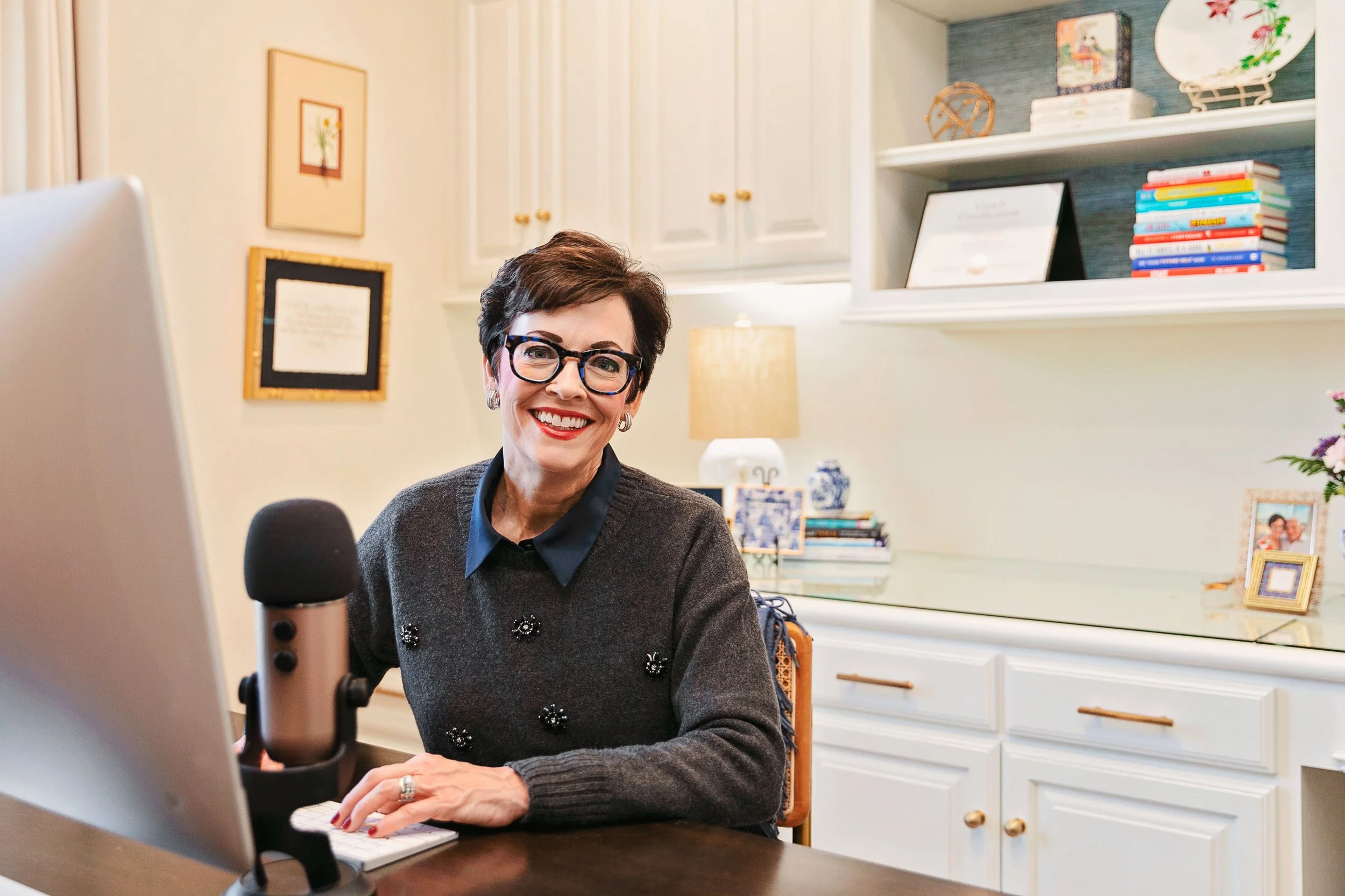 Debbie Shadid at her computer