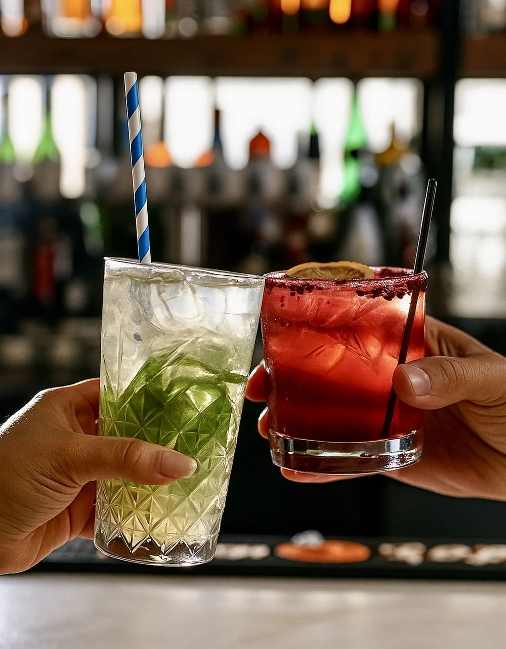 Two cocktails raised together at Lokanta Grill & Bar