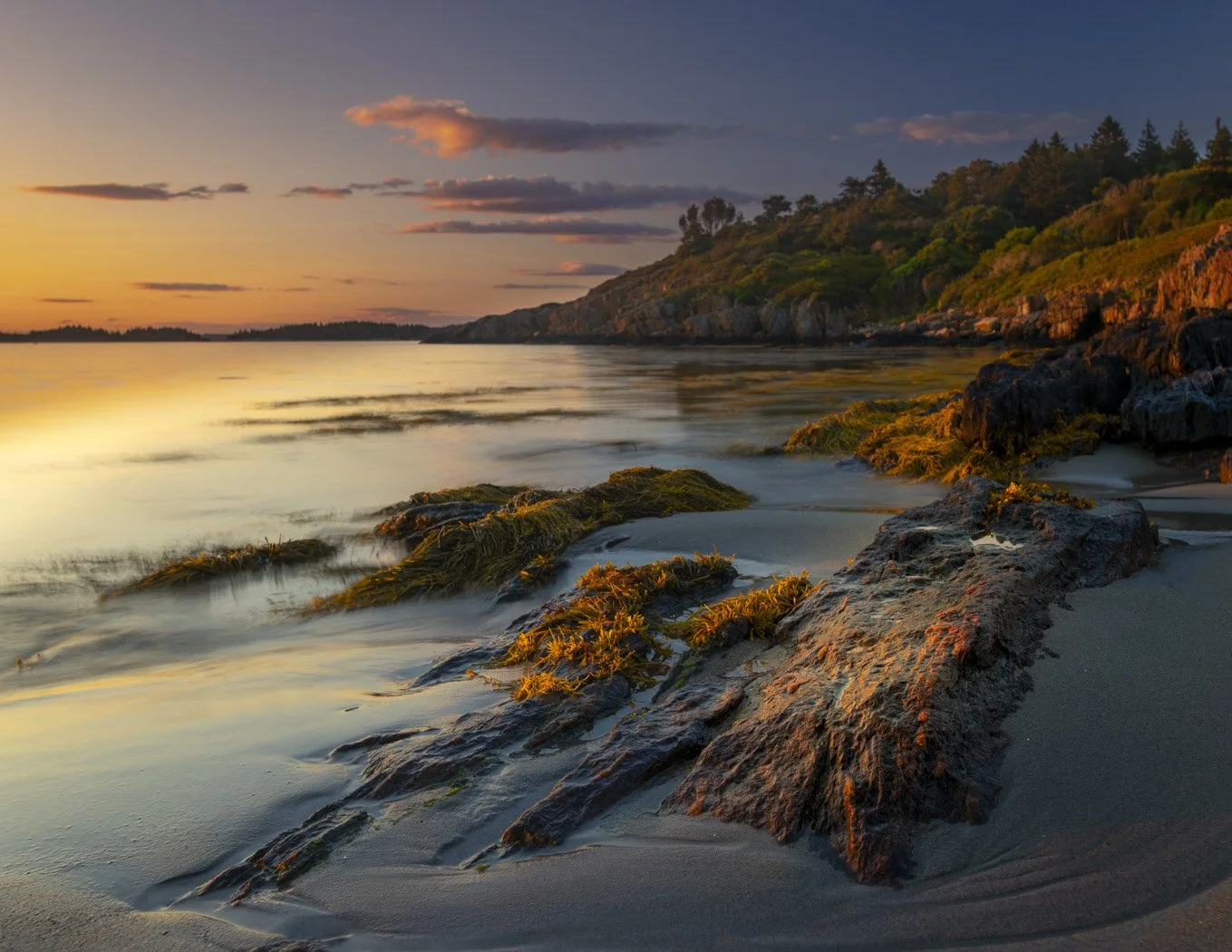 Warm evening light on shoreline rocks at Hermit Island