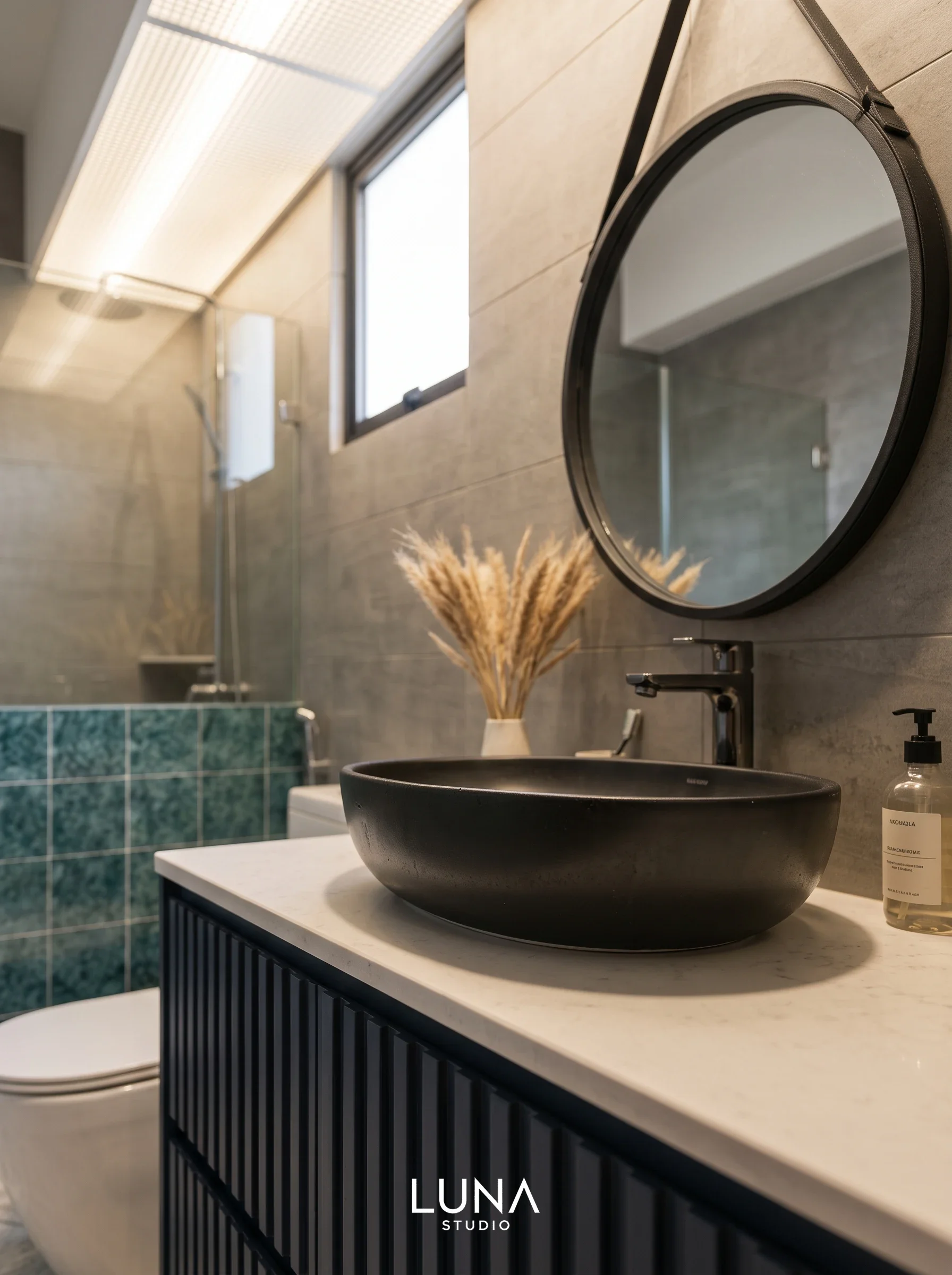Contemporary bathroom design with black vessel sink.