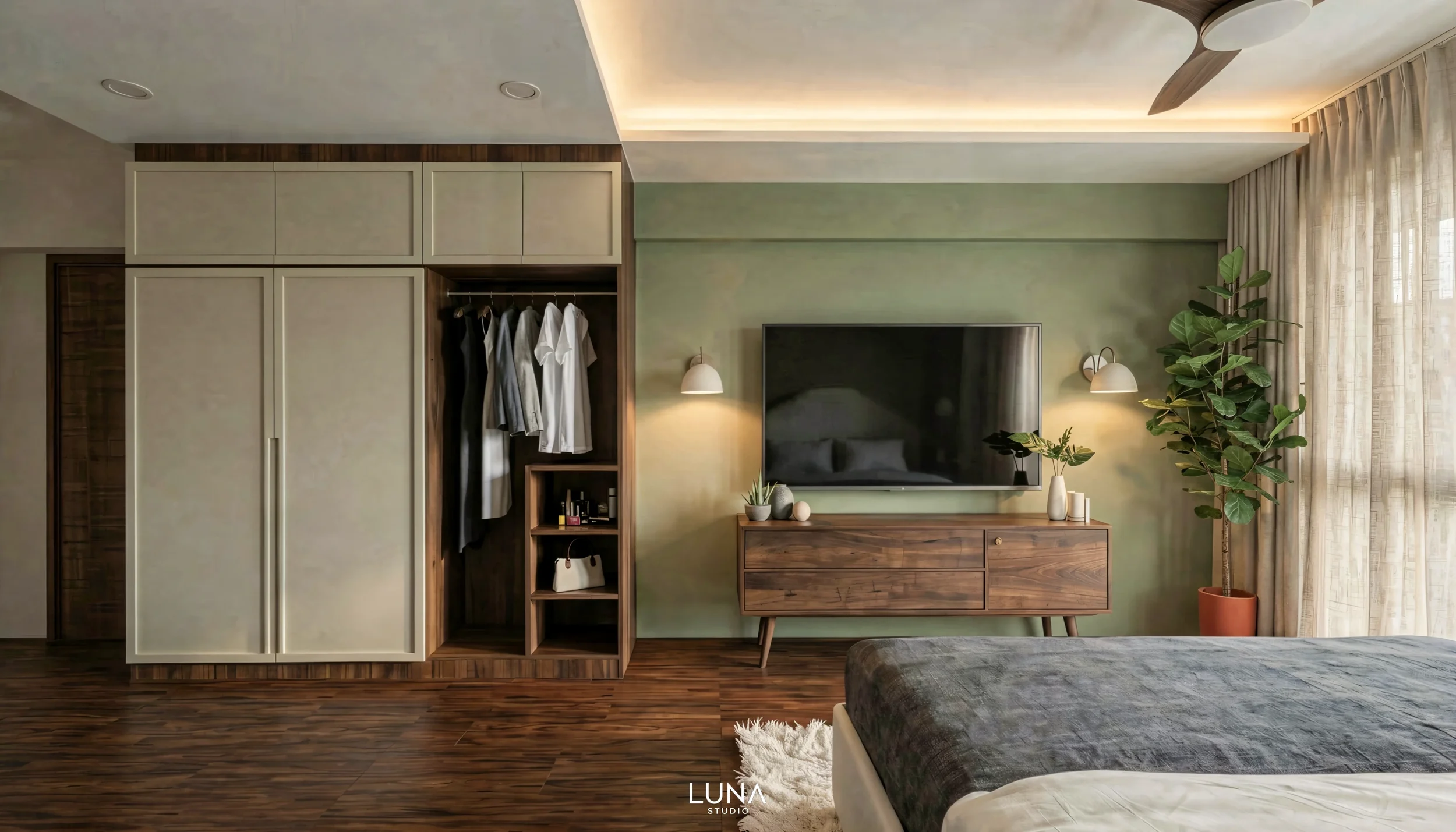 Bedroom with a green accent wall and a custom built in wardrobe.