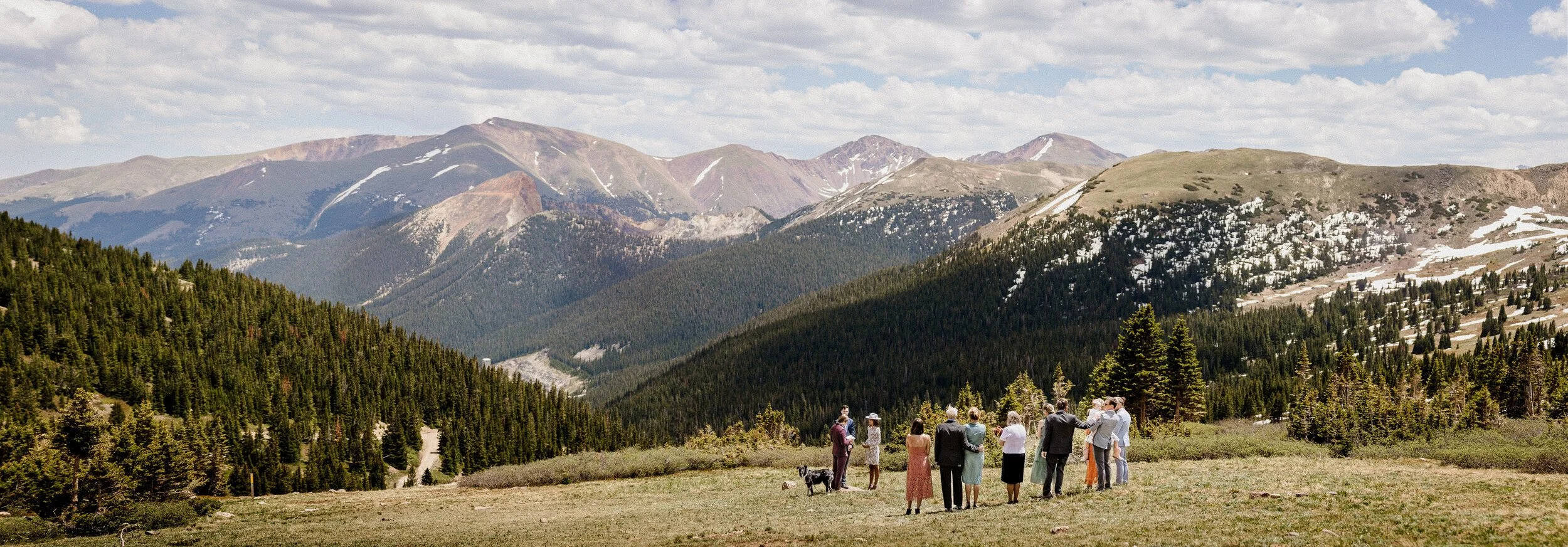 Couple at the A-Frame Club in Winter Park, Colorado on a bluebird June day during their elopement