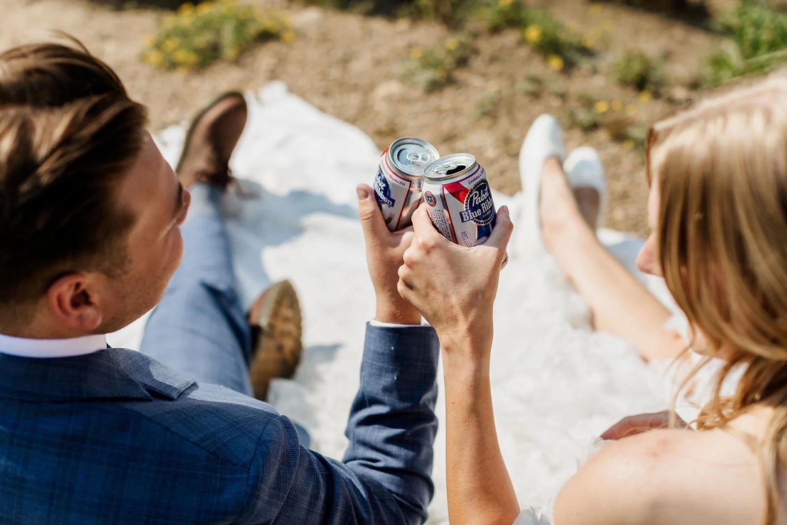Close up of hands holding pabst blue ribbon pbr beers