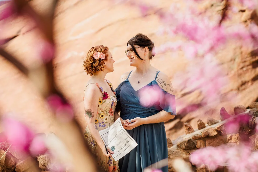 Signing a Colorado marriage license after an elopement ceremony