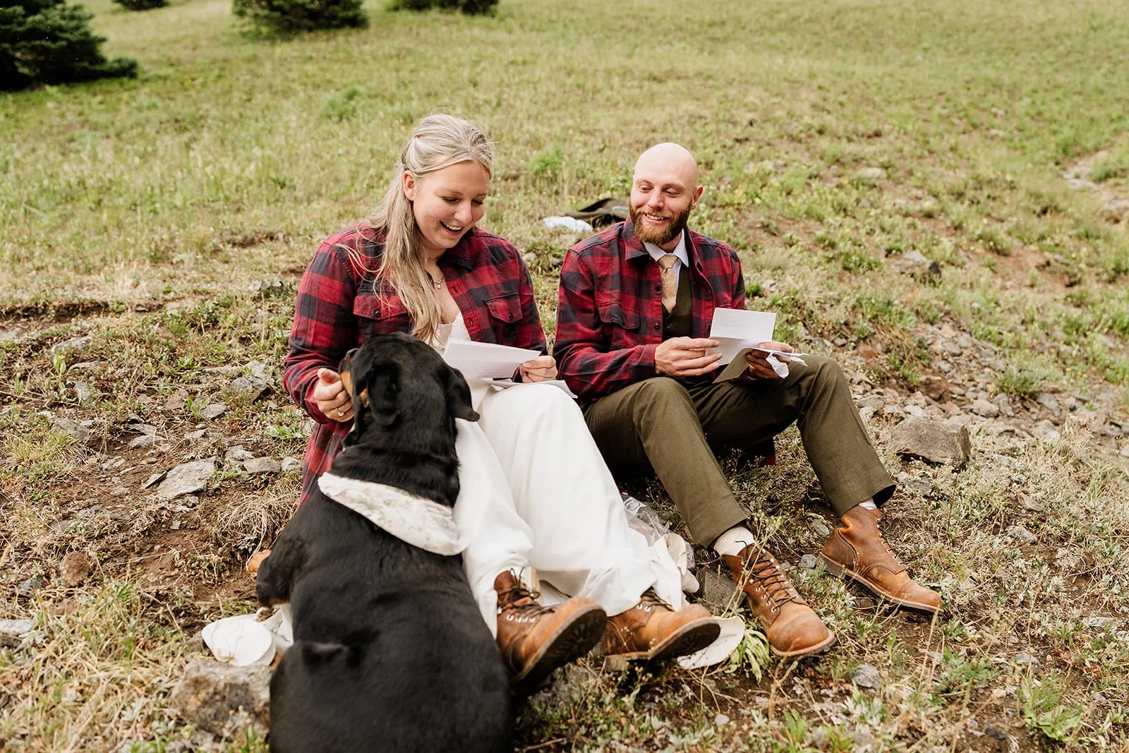 Couple in matching plaid flannels reads letters from their loved ones