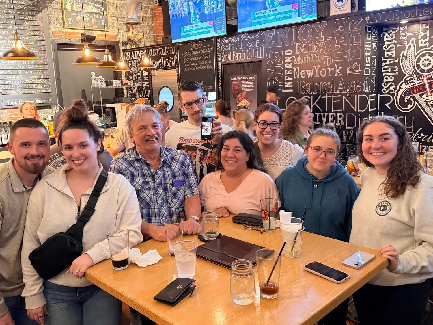 A trivia team around their table on a Classy Cat night