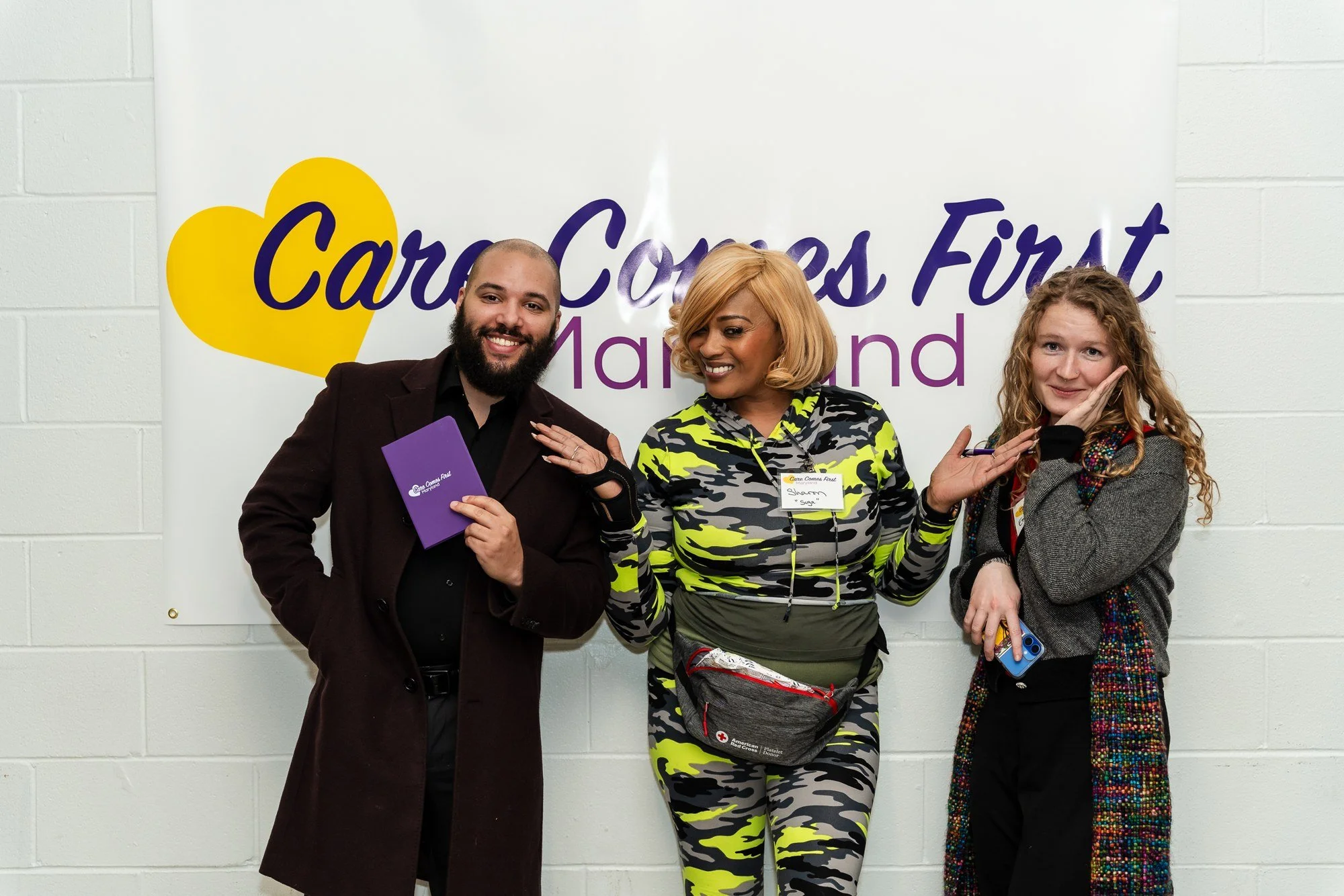 Three guests posing together at the 2025 Homecare Summit
