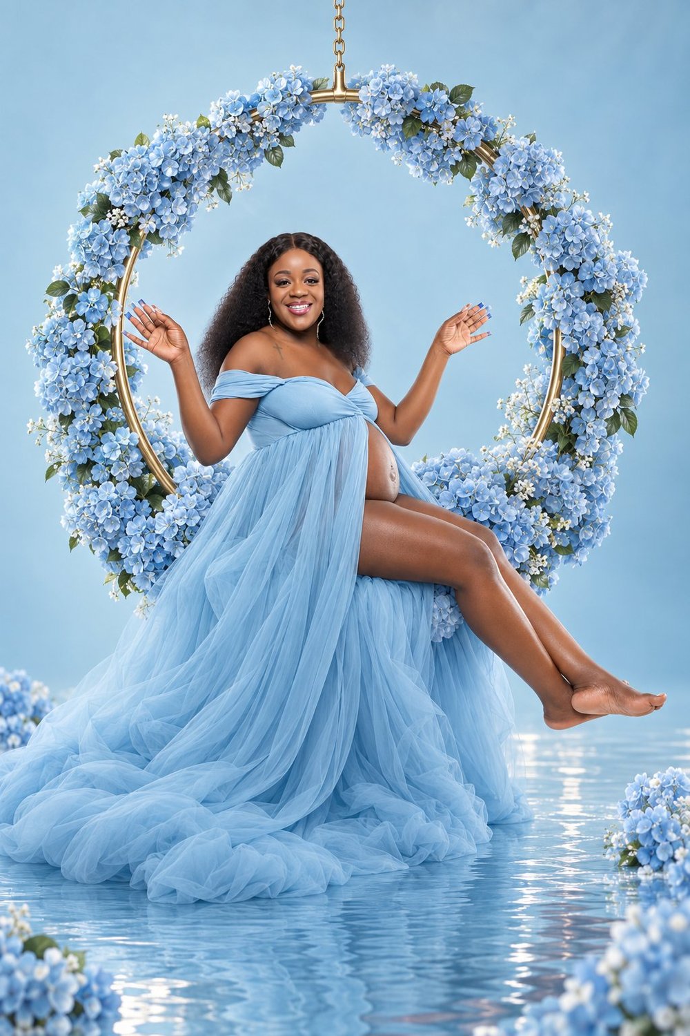 Capria smiling in a blue maternity gown framed by blue hydrangeas and a gold hoop