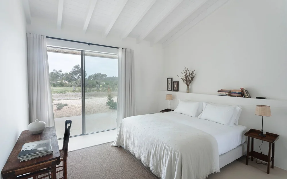 Junior Suite 3 bedroom with writing desk and garden doors at Amaria