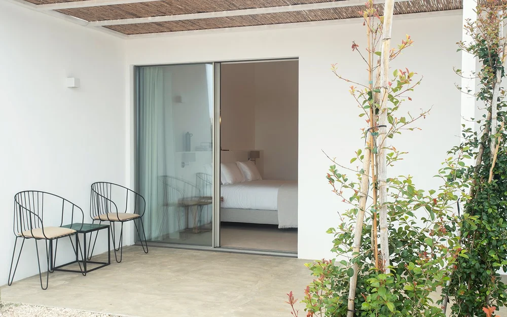 Two chairs on the terrace outside Junior Suite 2 at Amaria