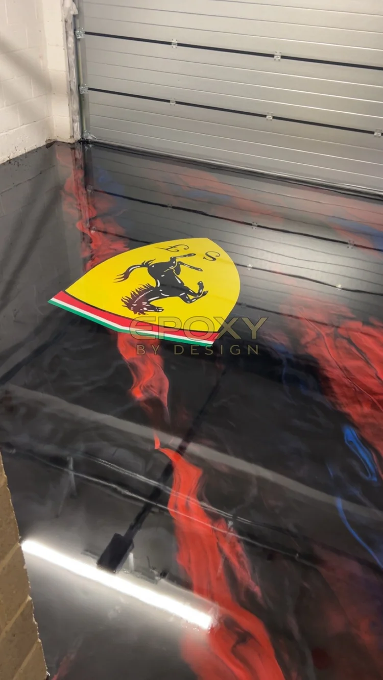 Black and red metallic epoxy garage floor