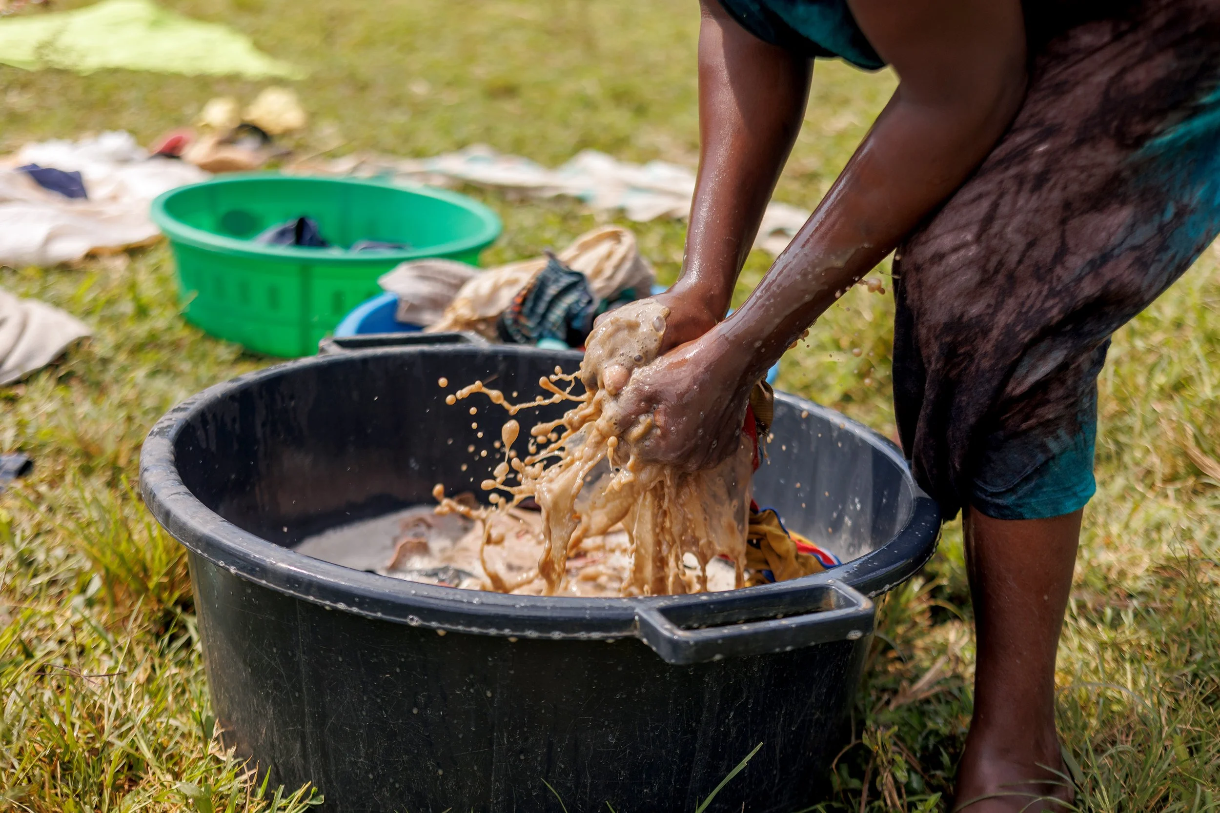 Washing clothes by hand