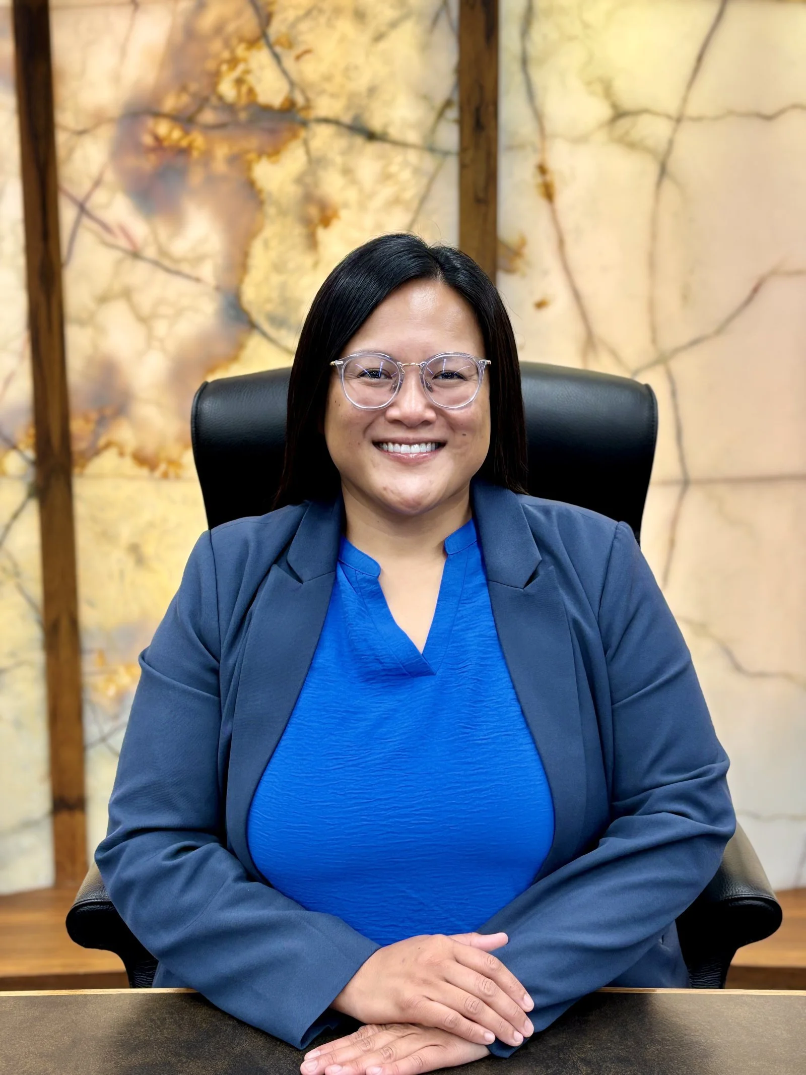 Irene Fernando, Hennepin County Board Chair and Commissioner for District 2, seated at the county dais