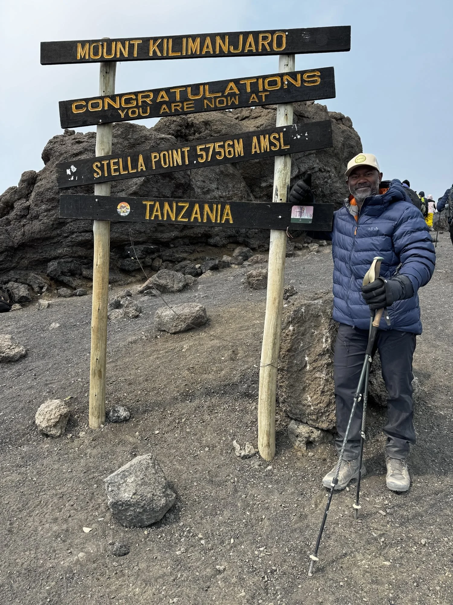 Luciano at the Stella Point sign, 5,756m