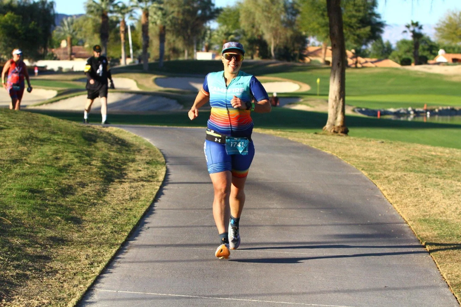 A Campfire Endurance athlete on the run course in team kit