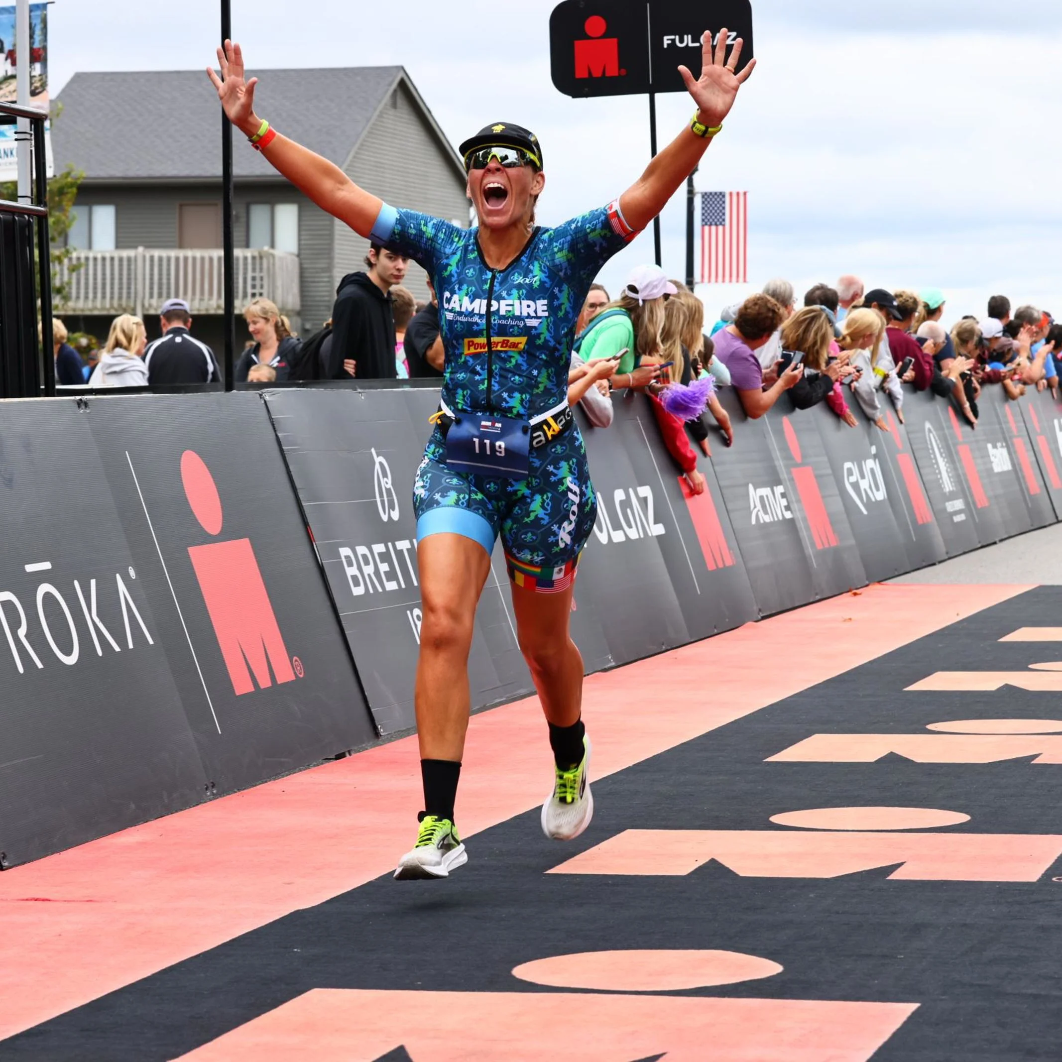 Alana crossing the finish line