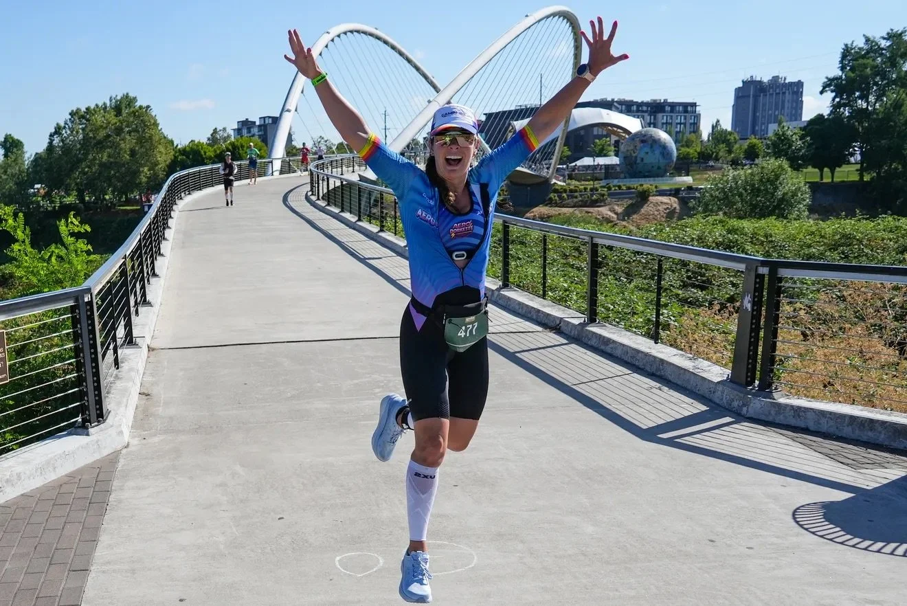Sara celebrating at the finish line at Salem