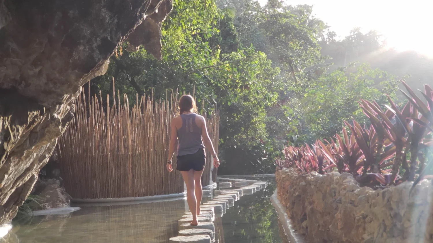 Golden hour walk along the jungle water path to the yoga dome at our Dominican Republic yoga retreat in Samana