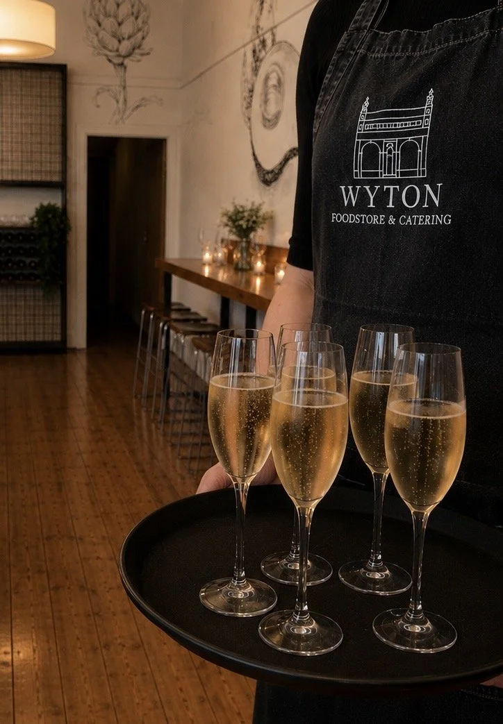 Champagne service at Wyton celebrating with team