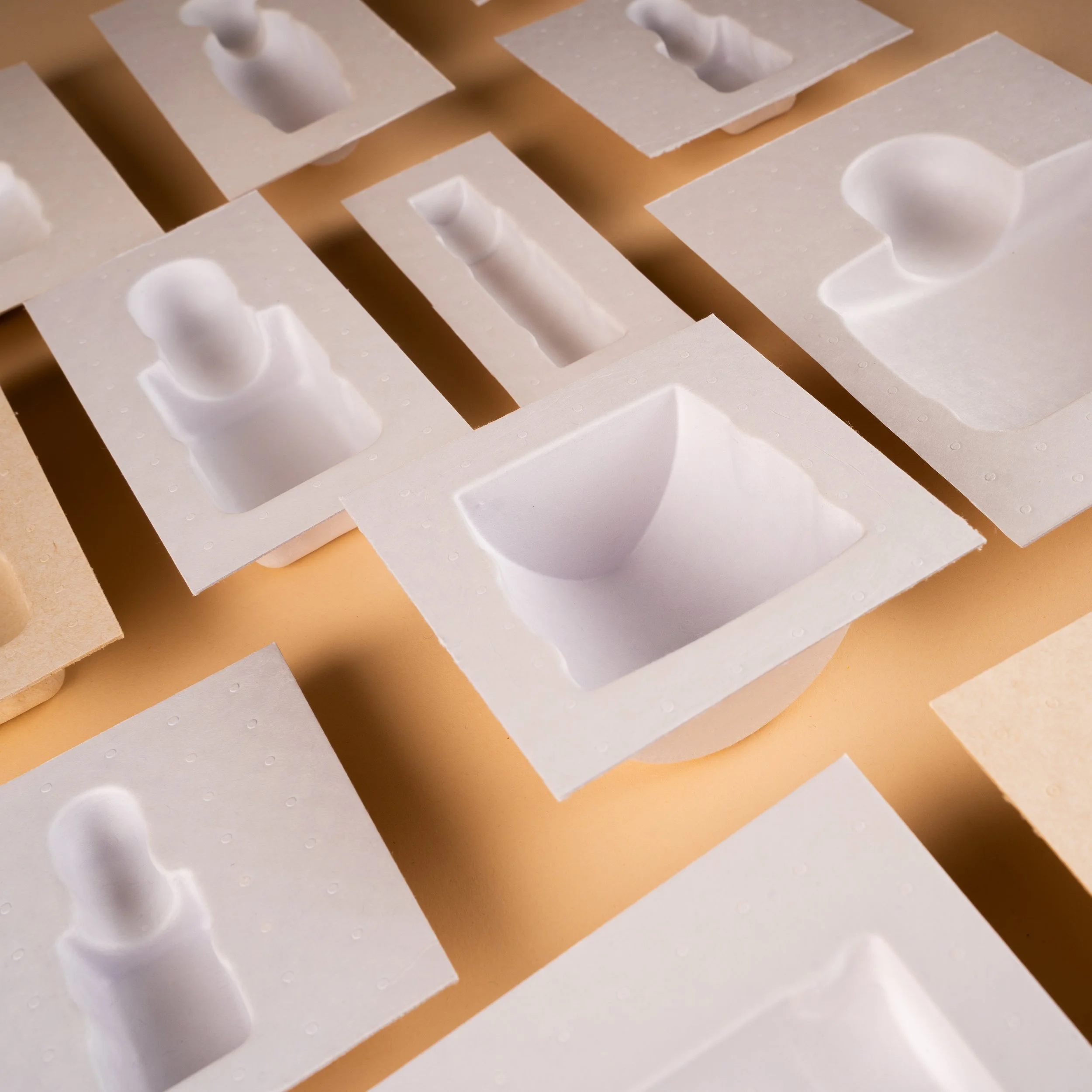 beauty products in molded fiber insert