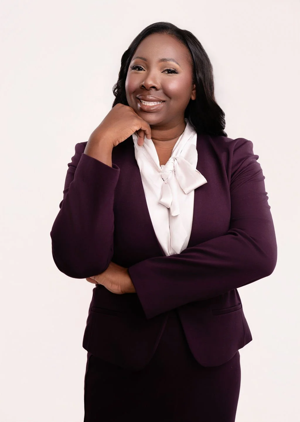 Eunice Zeigler wearing a burgundy suit