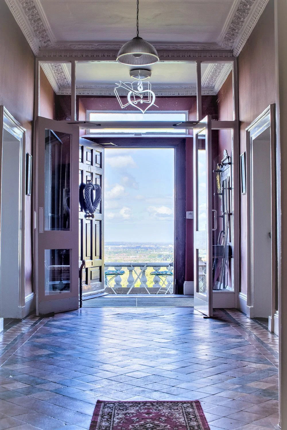 The entrance to Orlagh House opening toward the landscape