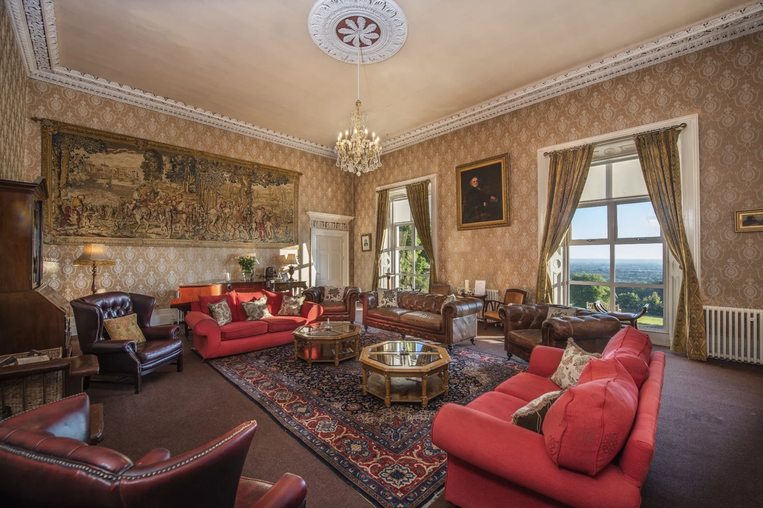 Drawing room with tapestry and sofas